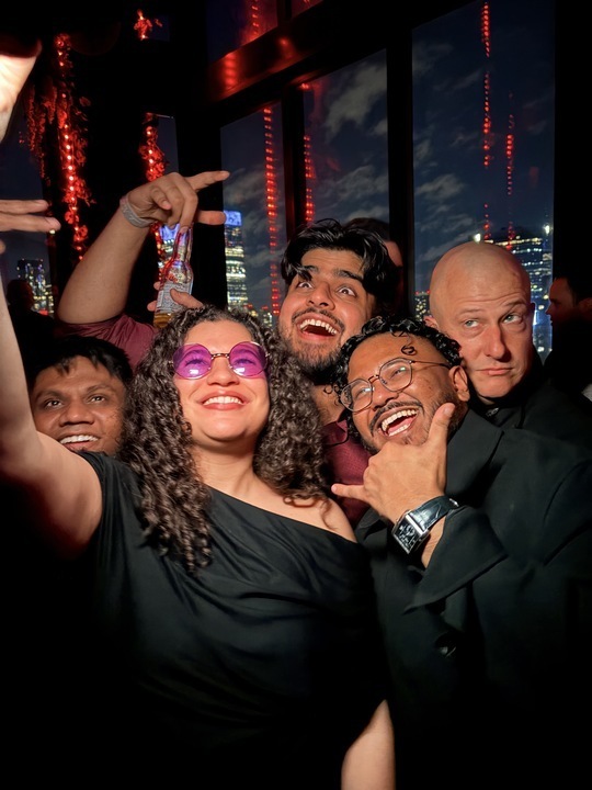 Kinetik team members taking a selfie