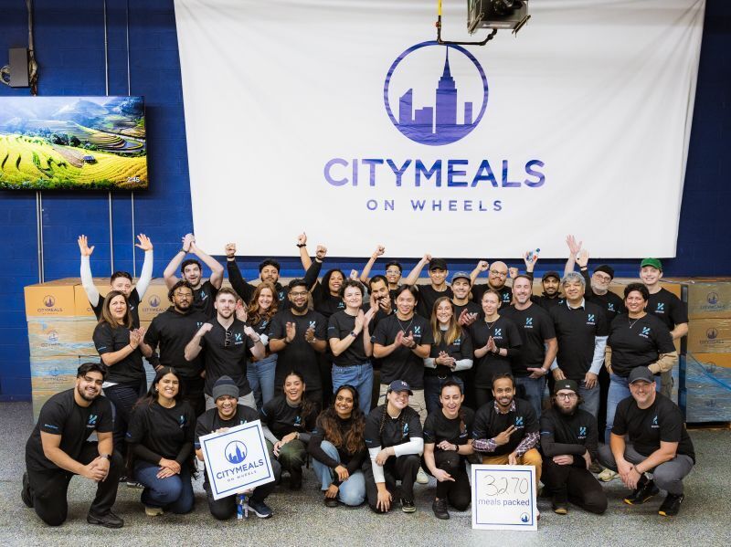 Kinetik team group photo at City Meals on Wheels 